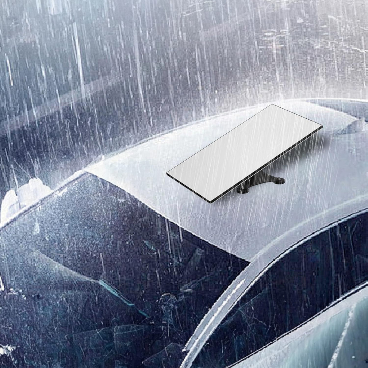 Schwarze Magnethalterung mit vier Schrauben in einem Anwendungsbeispiel auf einem Autodach