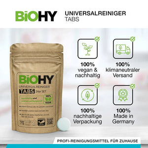 Hellbrauner Beutel mit Universalreiniger-Tabs und einzelner Reinigungstablette daneben und verschiedenen Labels